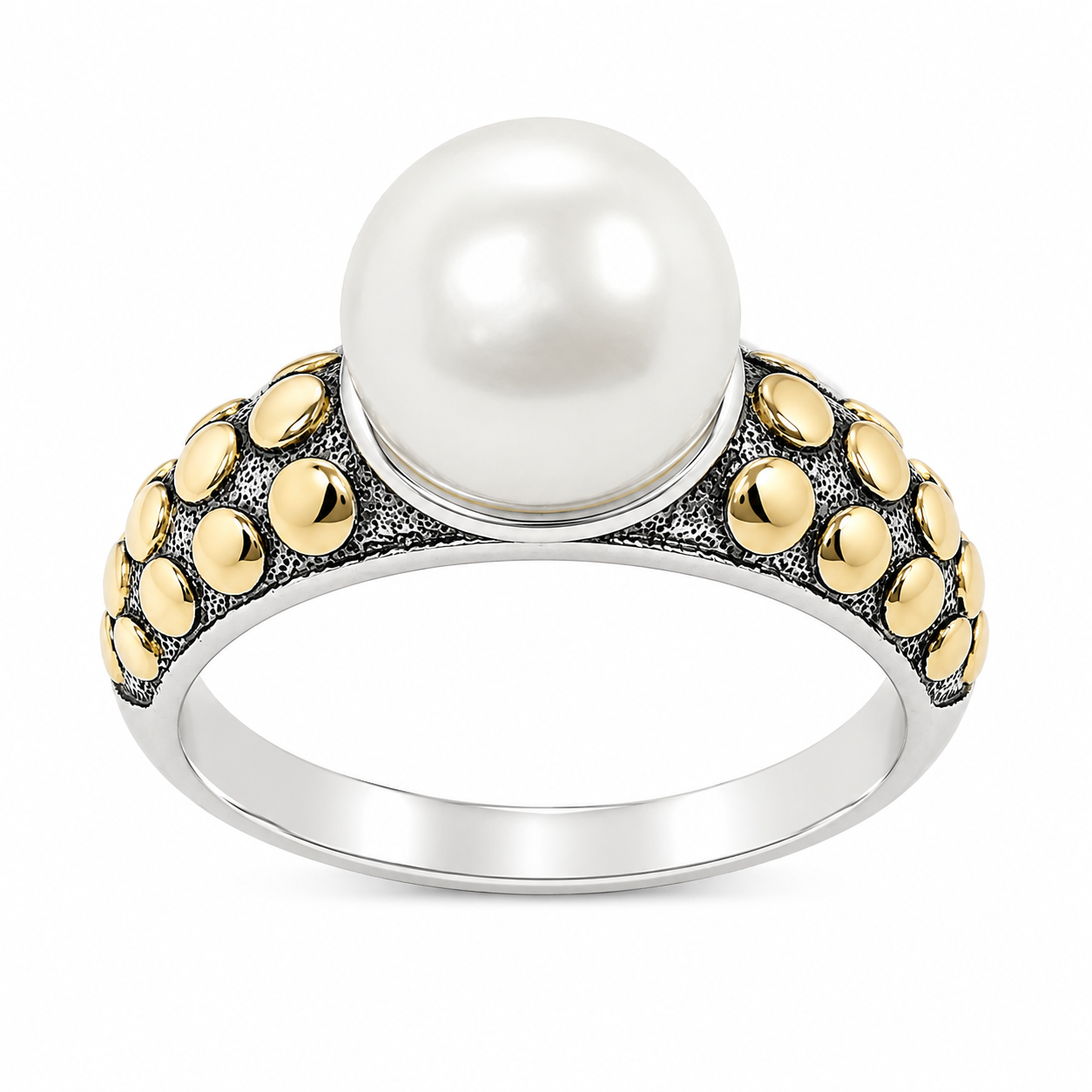 Sterling Silver Lustrous pearl centerpiece set against contrasting two-tone metalwork