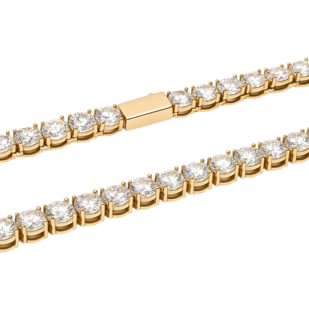 Gold bracelet with moissanite gemstones on a white background
