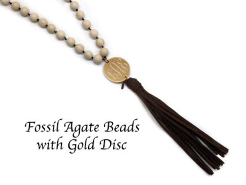 Beaded Suede Tassel Necklaces With Engraved Stainless Steel Disc In Gold Or Silver - Atlanta Jewelers Supply